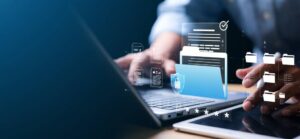 A person working on a laptop, with digital file icons and a lock symbol representing data security and organization.